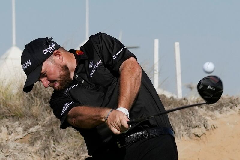 Shane Lowry tees off on the 11th hole. AP