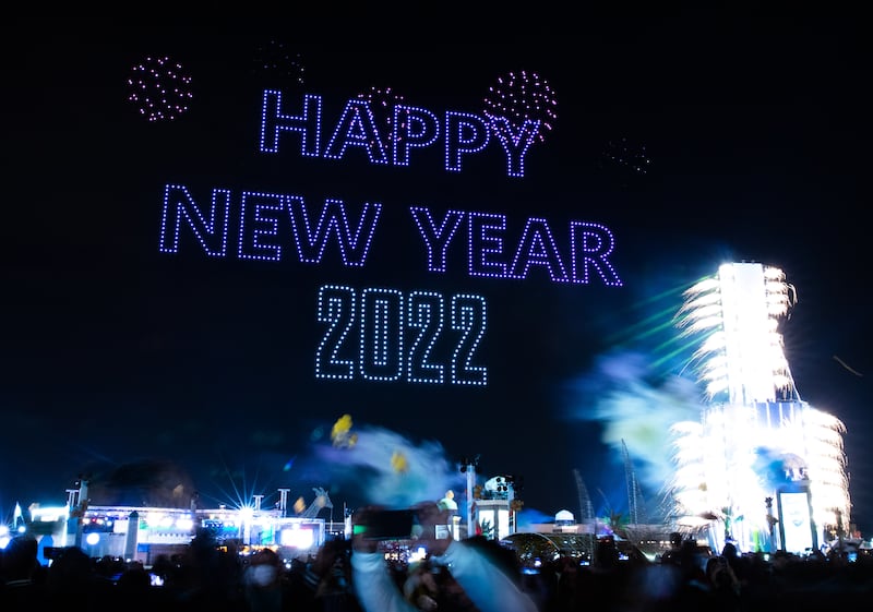 A drone display wishes visitors a Happy New Year at Sheikh Zayed Heritage Festival in Al Wathba, Abu Dhabi. Victor Besa / The National