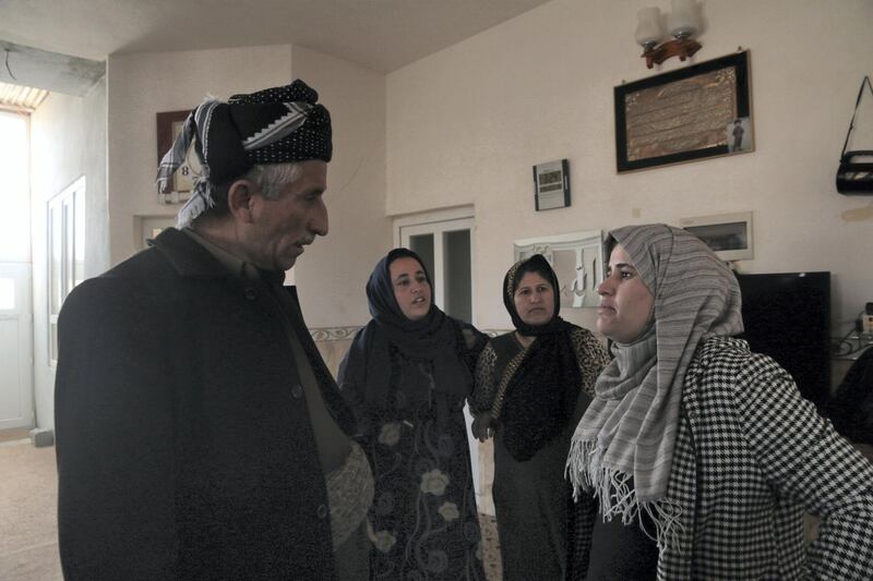 <p>Anti-FGM campaigner Mrs Kurdistan Rasul speaks to Said Abdulwahid, the village elder of Gomasheen.&nbsp;Florian Neuhof&nbsp;for The National</p>
