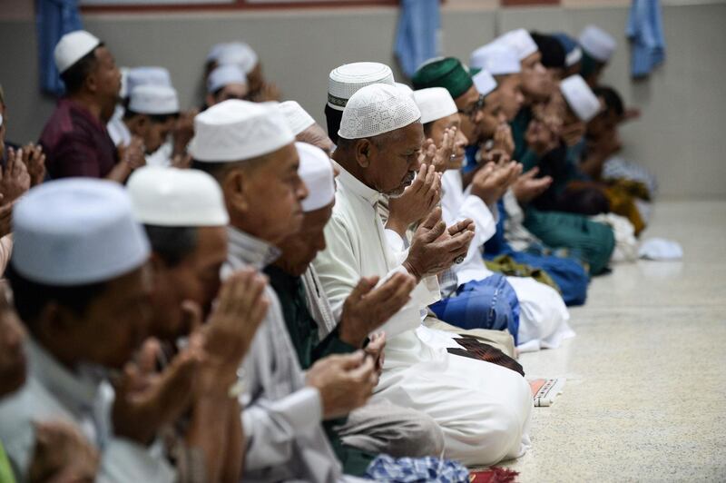 Muslim devotees offer Taraweeh prayers in a mosque during the holy month of Ramadan in Narathiwat, Malaysia.  AFP