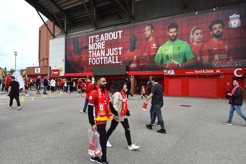 Fans outside the Anfield stadium. Reuters