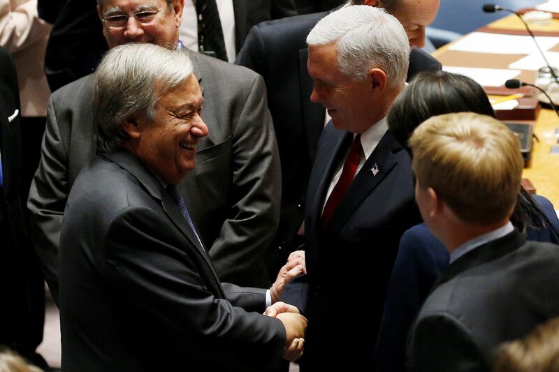 U.S. Vice President Mike Pence shakes hands with United Nations Secretary-General Antonio Guterres before the start of a U.N. Security Council meeting on peacekeeping at the 72nd United Nations General Assembly at U.N. headquarters in New York, U.S., September 20, 2017. REUTERS/Shannon Stapleton