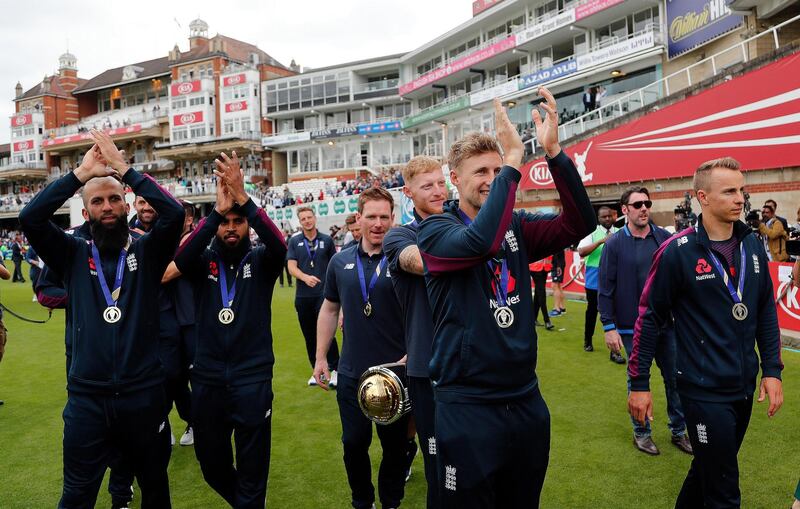 England's Cricket team waves to supporters to celebrate at the Oval in London one day after they won the Cricket World Cup. AP Photo