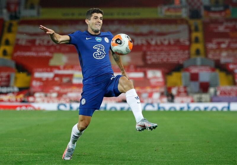 FILE - In this Wednesday, July 22, 2020 file photo, Chelsea's Christian Pulisic controls the ball during the English Premier League soccer match between Liverpool and Chelsea at Anfield Stadium in Liverpool, England. Frank Lampardâ€™s squad has certainly seen the most intriguing changes ahead of the new campaign - having been banned from signing players last summer, they have looked to make up for lost time and recruited some big names to replace long-term servants such as Pedro and Willian. (Phil Noble/Pool via AP, file)