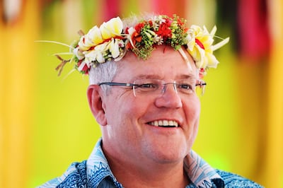 This handout photo taken on August 14, 2019 and released on August 15 by the Australian Prime Minister's Office shows Australia's Prime Minister Scott Morrison arriving for the Pacific Islands Forum in Tuvalu.  Australia's Scott Morrison arrived at a meeting of Pacific island leaders in Tuvalu with Canberra's regional leadership in question amid intense scrutiny of his government's climate change policies. - XGTY  -----EDITORS NOTE --- RESTRICTED TO EDITORIAL USE - MANDATORY CREDIT "AFP PHOTO / AUSTRALIAN PRIME MINISTER'S OFFICE " - NO MARKETING - NO ADVERTISING CAMPAIGNS - DISTRIBUTED AS A SERVICE TO CLIENTS - NO ARCHIVES

 / AFP / AUSTRALIAN PRIME MINISTER'S OFFICE / Adam TAYLOR / XGTY  -----EDITORS NOTE --- RESTRICTED TO EDITORIAL USE - MANDATORY CREDIT "AFP PHOTO / AUSTRALIAN PRIME MINISTER'S OFFICE " - NO MARKETING - NO ADVERTISING CAMPAIGNS - DISTRIBUTED AS A SERVICE TO CLIENTS - NO ARCHIVES

