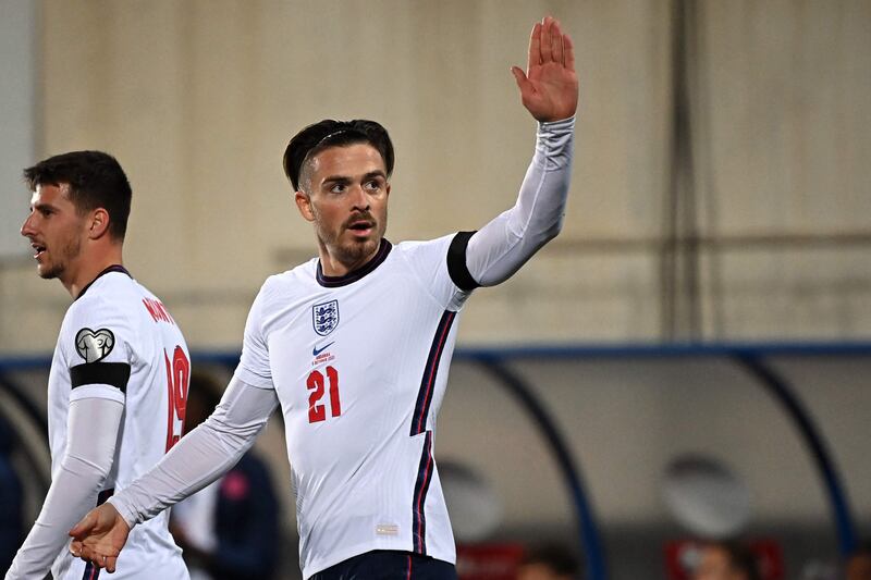 Jack Grealish celebrates after his striker. AFP