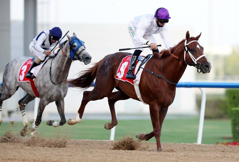 Dubai, United Arab Emirates - Reporter: Amith Passela. Sport. Horse Racing. Midnight Sands ridden by Patrick Dobbs (purple) and trained by Doug Watson wins the Burj Nahaar on Super Saturday at Meydan. Dubai. Saturday, March 6th, 2021. Chris Whiteoak / The National