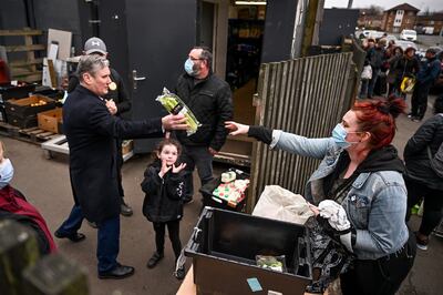 Labour Party leader Sir Keir Starmer visits a food bank in Glasgow. Getty