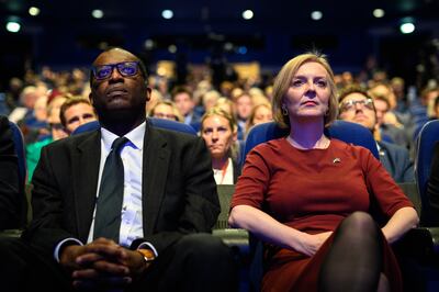  Kwasi Kwarteng and Liz Truss at the Conservative Party conference last week. Both have been accused of introducing a 'kamikaze budget' of unfunded tax cuts. Getty 

