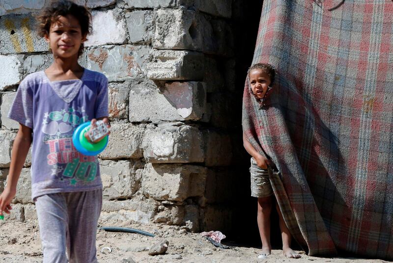 Palestinian children play in Gaza City.  AFP