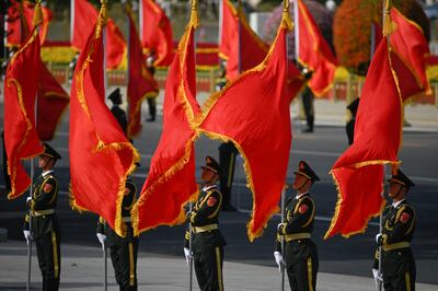 Chinese guards prepare for an official visit. Reuters