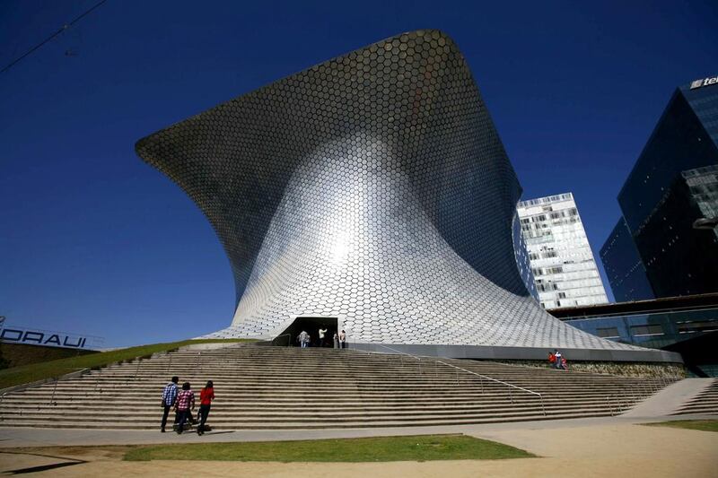 10 Mexico: Latin American ultra high net worth individuals, including Mexicans, numbered 9,677 in 2013. Above, people walk the stairs towards the main entrance to the Soumaya Museum in Mexico City. Marco Ugarte / AP Photo