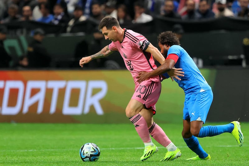 Al Hilal's Saudi defender Yasser Al Shahrani marks Inter Miami's Argentine forward Lionel Messi. AFP