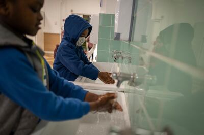 PARIS, FRANCE - MAY 15: (EDITORIAL USE ONLY) Hand washing between all activities is compulsory at the Tanger B elementary school on its second day resuming classes on May 15, 2020 in the 19th Arrondissement of Paris, France.Of the usual 224 students only 26 were able to attend this day due to the new rules to fight the coronavirus pandemic. France is beginning to ease its nationwide lockdown imposed to curb the spread of Covid-19, which has killed more than 27,000 people in the country. (Photo by Veronique de Viguerie/Getty Images)