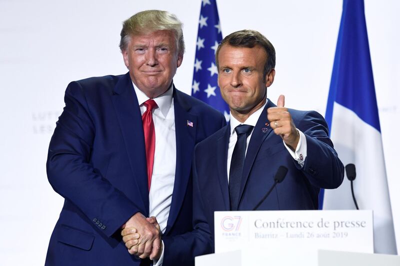 France's President Emmanuel Macron and US President Donald Trump pose during a  joint press conference in Biarritz, south-west France on August 26, 2019. AFP