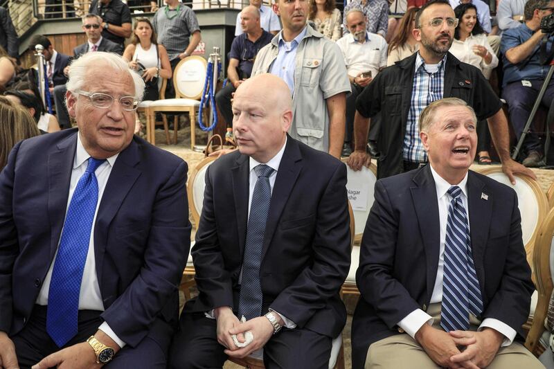 (L to R) US Ambassador to David Friedman, White House Middle East envoy Jason Greenblatt, and US Senator Lindsey Graham (R-SC) attend the opening of an ancient road at the City of David archaeological and tourist site in the Palestinian neighbourhood of Silwan in east Jerusalem on June 30, 2019. White House adviser Jason Greenblatt and US ambassador to Israel David Friedman attended the event marking the completion of an archaeological project next to the Old City in mainly Palestinian east Jerusalem, according to the group, the City of David Foundation. Greenblatt confirmed their planned attendance and dismissed accusations it was a further acknowledgement of Israeli sovereignty over east Jerusalem. / AFP / POOL / Tsafrir Abayov

