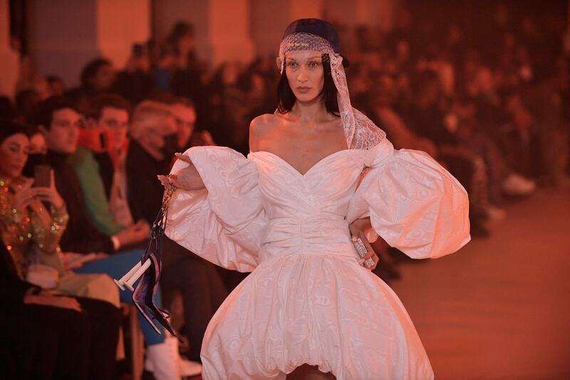 US model Bella Hadid presents a bridal-inspired creation. AFP