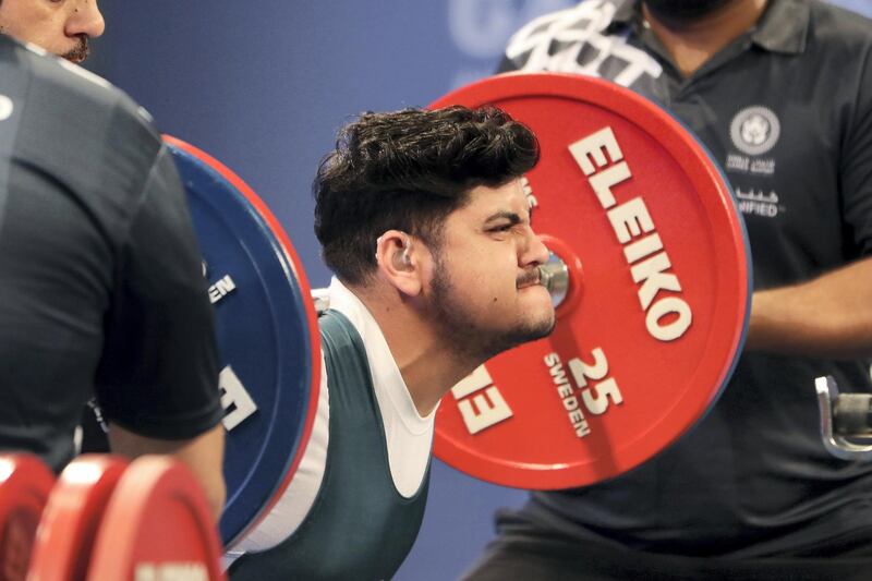 ABU DHABI , UNITED ARAB EMIRATES , March 19 – 2019 :- Imran Arif from Pakistan participating in the Male 93kg category during the powerlifting competition at the Special Olympic games held at ADNEC in Abu Dhabi. ( Pawan Singh / The National ) For News/Instagram/Online/Big Picture