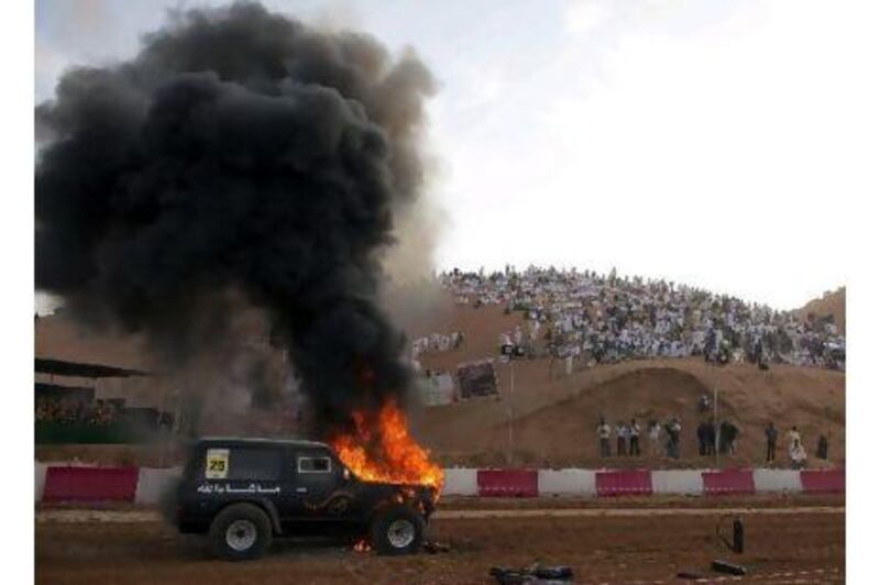 This truck named "Dangerous" from the Tariq Performance Garage in Dubai burst into flames on the starting line during the Awafi UAE Sand Drag Champions 2010 races in Ras al Khaimah, December 24, 2010. The driver Rashid Mohammad Saeed was not injured. Officials said the fire started when an electrical short ignited the fuel.