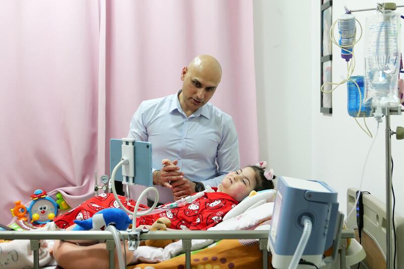 FUJAIRAH, UNITED ARAB EMIRATES , Feb 27, 2021 – Faraz Qureshi with his daughter Mirha (4 years old) who is the victim of a rare disease at his home in Fujairah. (Pawan Singh / The National) For News/Online/Instagram. Story by Nick