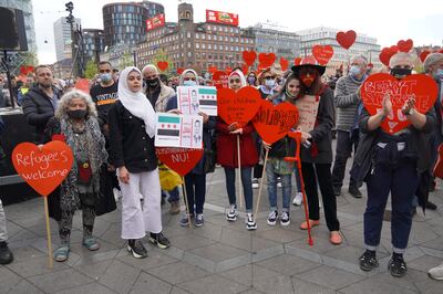 People attend a demonstration to show support for Syrian refugees in Copenhagen in May. Getty Images