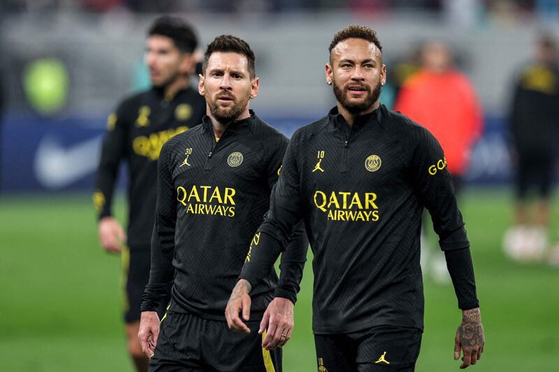 Paris Saint-Germain's Brazilian forward Neymar and Argentine star Lionel Messi during a  training session at Khalifa International Stadium in Doha on Wednesday, January 18, 2023. AFP