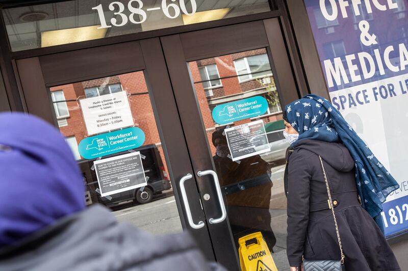 Signage is displayed on a closed New York State Department of Labor building in the Queens borough of New York, U.S., on Tuesday, April 14, 2020. What started as the worst-case scenario for U.S. unemployment is quickly becoming reality. Some economists now see the jobless rate surging to 20% as soon as this month -- and there's no guarantee it would stop there. Photographer: Jeenah Moon/Bloomberg