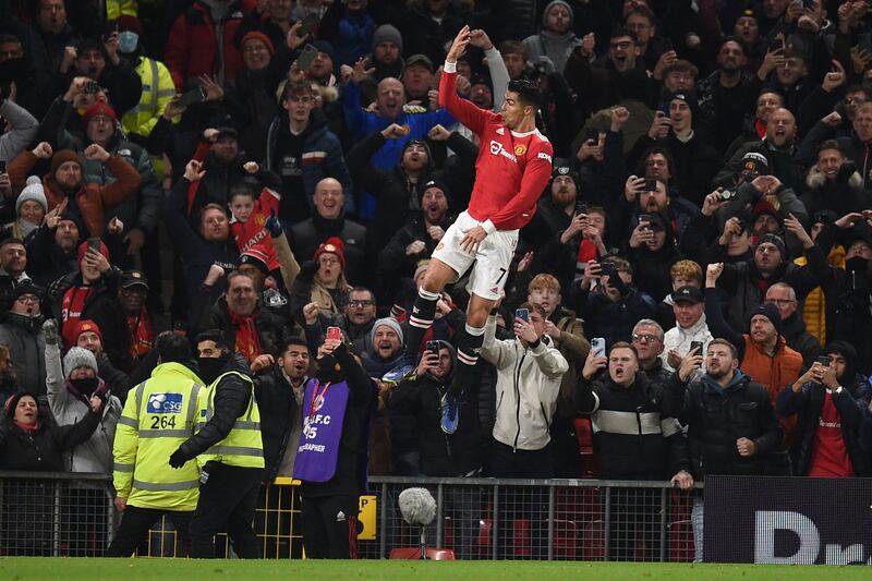 Manchester United's Cristiano Ronaldo celebrates after scoring in the Premier League match against Arsenal at Old Trafford on December 2. AFP