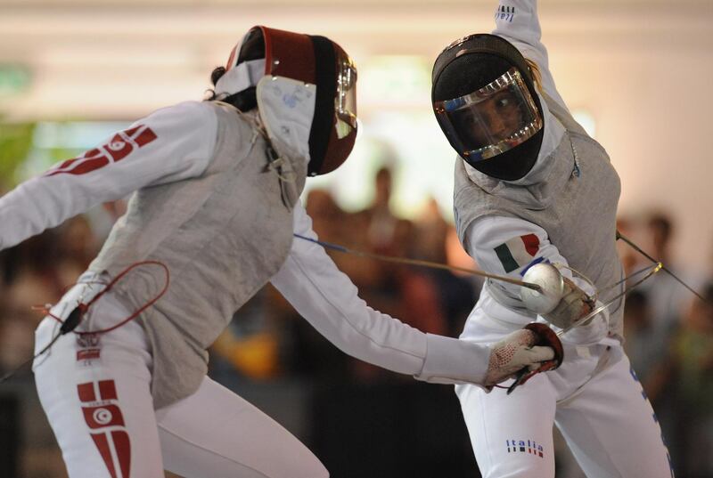 PESCARA, ITALY - JUNE 29:  Granbassi Margherita (R) of Italy battles with Boubakri Ines of Tunisia in the semifinals match in the Women's individual foil at the Pineto Palasport on June 29, 2009 in Pescara, Italy.  (Photo by Getty Images)