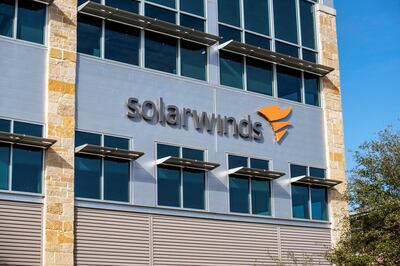 FILE PHOTO: The SolarWinds logo is seen outside its headquarters in Austin, Texas, U.S., December 18, 2020. REUTERS/Sergio Flores/File Photo