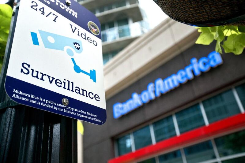 A surveillance sign posted outside a Bank of America branch in Atlanta. David Goldman / AP Photo