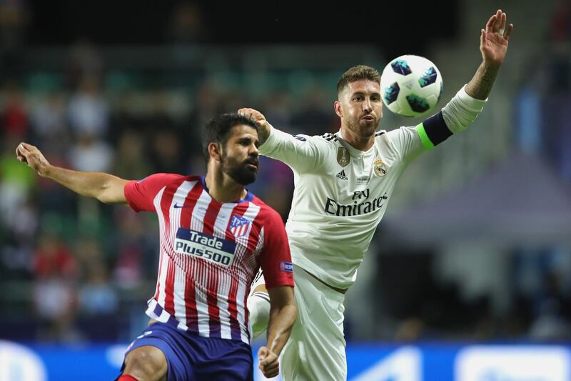 Ramos battles for the ball with Diego Costa of Atletico. Getty