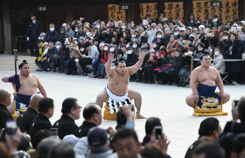 Sumo grand champion of "yokozuna" Kakuryu of Mongolia takes part in a traditional ring-entering ceremony at Meiji shrine in Tokyo. AFP