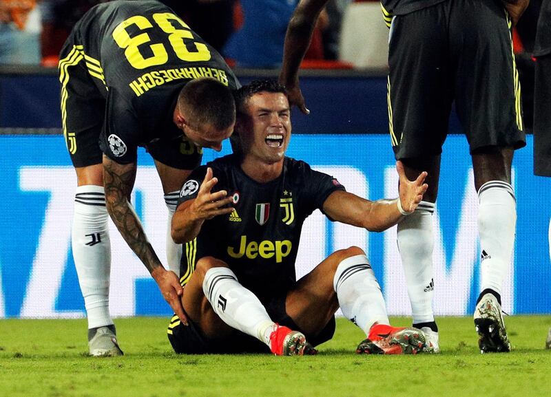 epaselect epa07033085 Juventus' forward Cristiano Ronaldo reacts after being sent off during the UEFA Champions League soccer match between Valencia CF and Juventus FC at Mestalla stadium in Valencia, Spain, 19 September 2018.  EPA/JUAN CARLOS CARDENAS