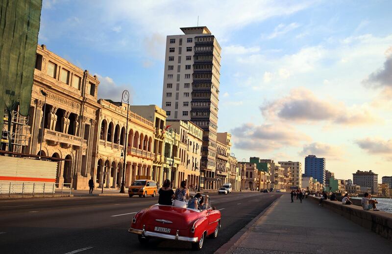 Tourists in a car at the esplanade in Havana, Cuba. Cubans welcomed their new president Miguel Diaz-Canel without surprise and with the hope that 'something improves' in the post-Castro era. Alejandro Ernesto / EPA.