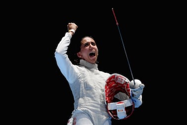 RIO DE JANEIRO, BRAZIL - AUGUST 10: Ines Boubakri of Tunisia celebrates victory over Eleanor Harvey of Canada during the women's individual foil quarterfinal on Day 5 of the Rio 2016 Olympic Games at Carioca Arena 3 on August 10, 2016 in Rio de Janeiro, Brazil. (Photo by Matthias Hangst/Getty Images)