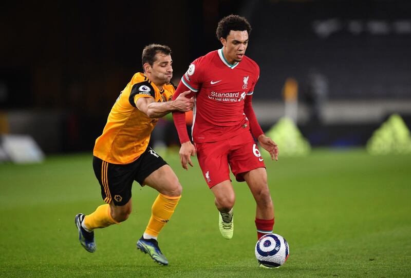 Liverpool right-back Trent Alexander-Arnold under pressure from Wolves' Jonny during the Premier League match at Molineux on March 15. PA