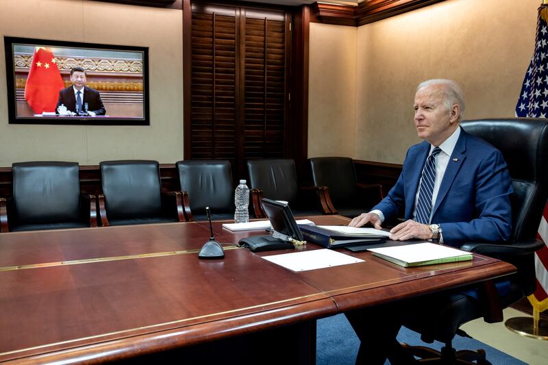 US President Joe Biden holds virtual talks with Chinese President Xi Jinping from the White House in Washington in March. Reuters