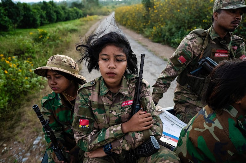 Female members of the Mandalay People’s Defence Forces head to the front line amid clashes with the Myanmar military in northern Shan State. AFP