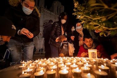 People pay tribute in front of the Notre Dame Basilica on October 29, 2020 in Nice, France. Getty Images