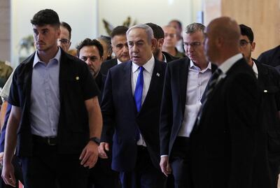 Israeli Prime Minister Benjamin Netanyahu arrives to his Likud party faction meeting at the Knesset, Israel's parliament, on Monday. Reuters 
