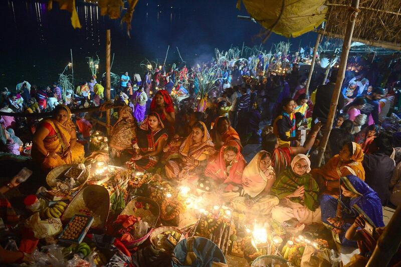 Indian Hindu devotees perform religious rituals on the banks of the river Yamuna in Allahabad. AFP