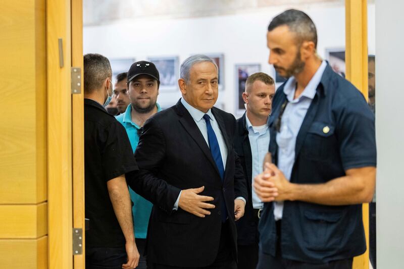 Israeli Prime Minister Benjamin Netanyahu arrives to speak to the Israeli Parliament in Jerusalem, Sunday, May 30, 2021. (Yonatan Sindel/Pool via AP)