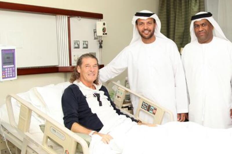 Al Wasl coach Bruno Metsu is visited in hospital by board members from the club.