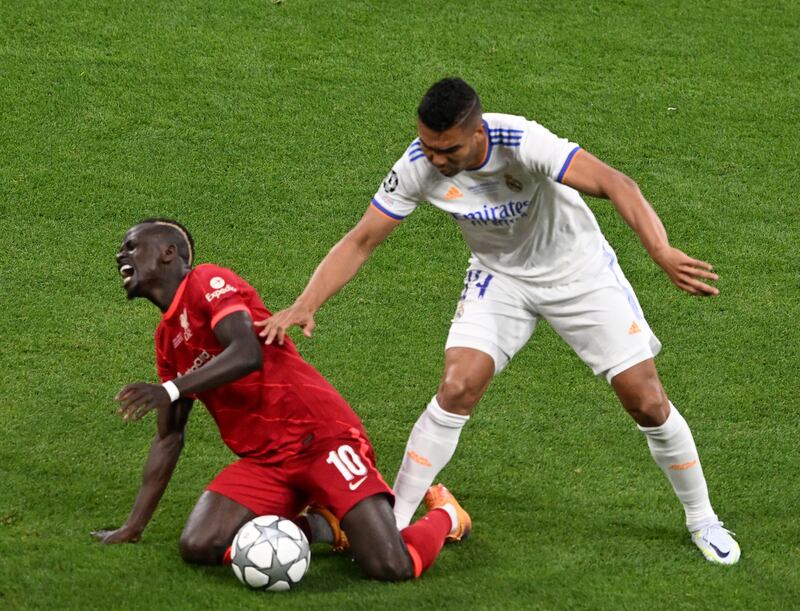 Sadio Mane - 7. The Senegalese hit the post and caused Real some alarm. He was the victim of some rugged defending. EPA