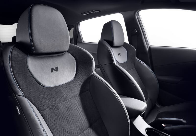 All three of the cars have a minimalist interior.