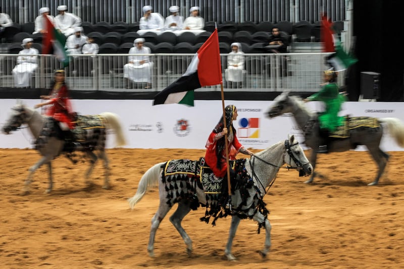 Riders and their horses on show during the Abu Dhabi International Hunting and Equestrian Exhibition (Adihex) in the UAE capital. AFP
