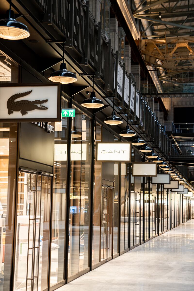 Shops line Turbine Hall A, part of the scheme to transform the site into a new visitor attraction for London. Photo: Backdrop Productions