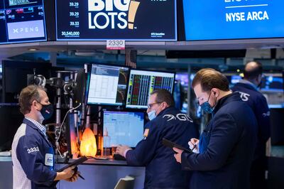 Traders work on the New York Stock Exchange floor on January  21, 2022. AP