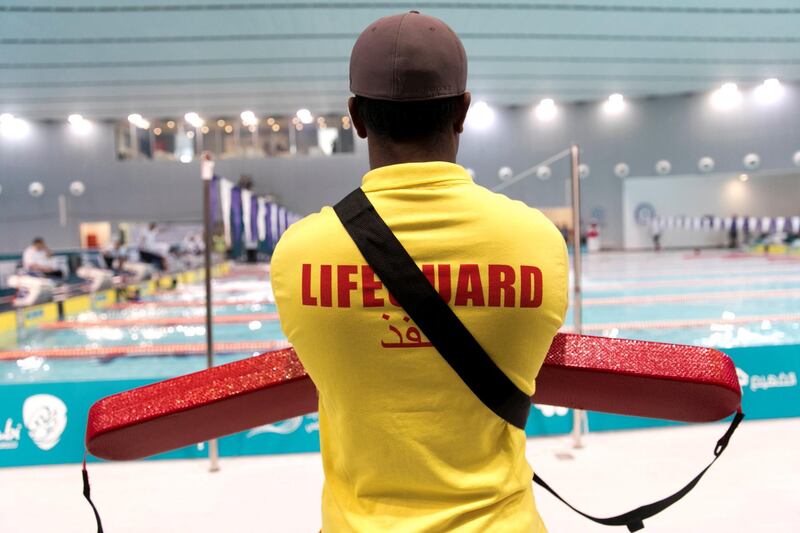 ABU DHABI, UNITED ARAB EMIRATES - MARCH 19, 2018. A lifeguards at the swimming competition of IX MENA Special Olympic games held at NYU Abu Dhabi.

(Photo: Reem Mohammed/ The National)

Reporter:  Ramola Talwat
Section:  NA + SP